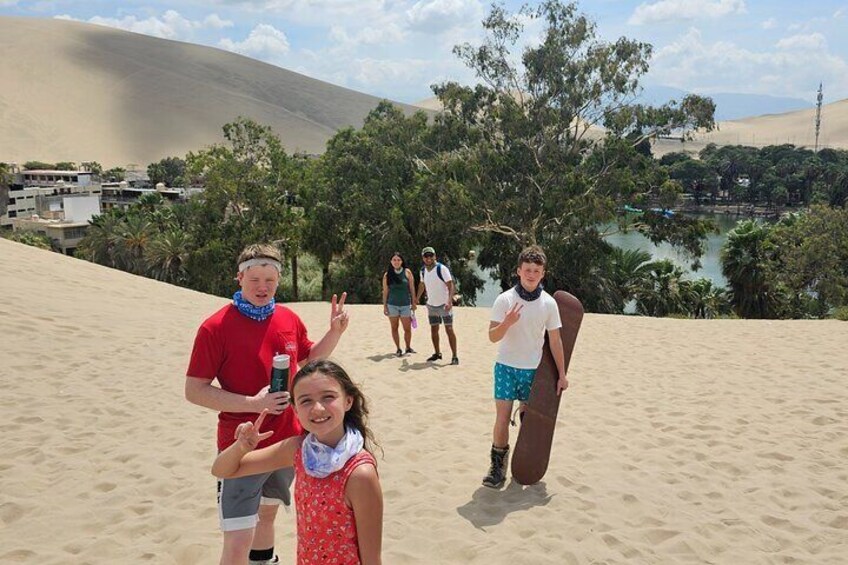 Climbing the dunes of Huacachina