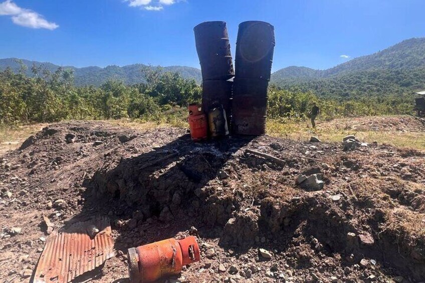 Barrel and gas tank mountainous shooting range Cambodia