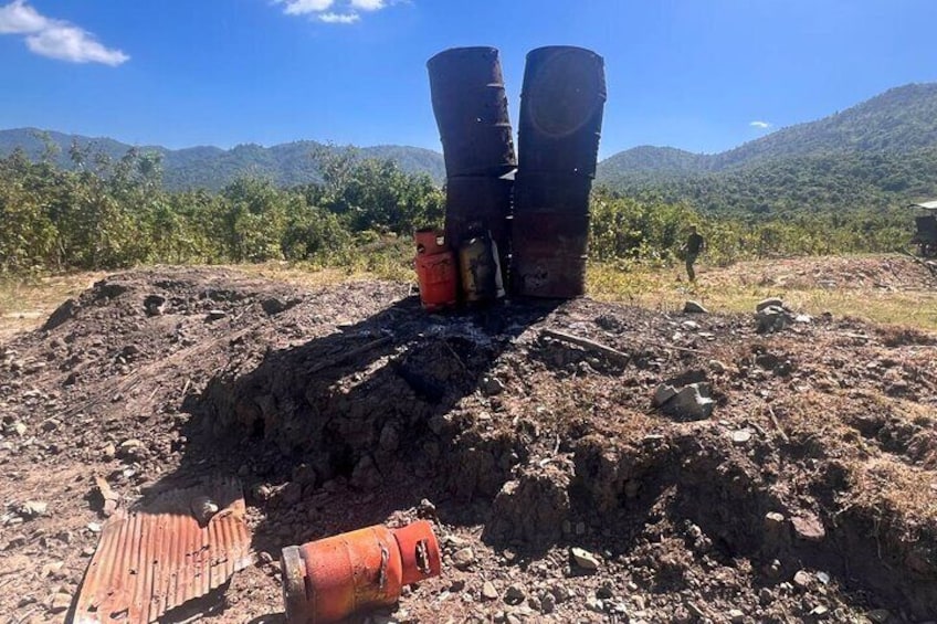 Barrel and gas tank mountainous shooting range Cambodia