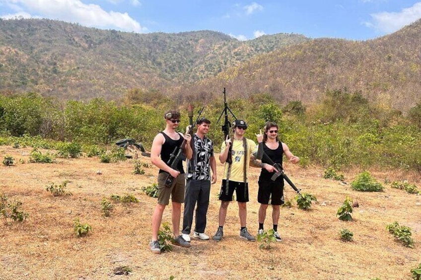 group photo mountainous shooting range Cambodia