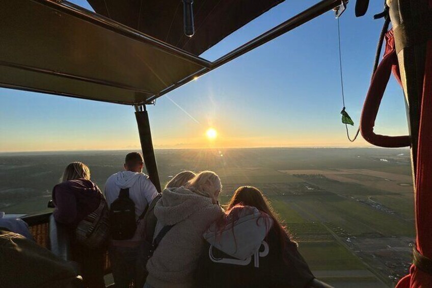Enjoy the view aboard our hot air balloons at sunset