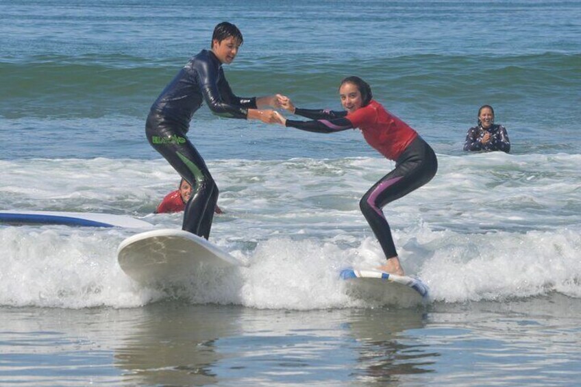 Learning to surf with Sandbar Surf School! 