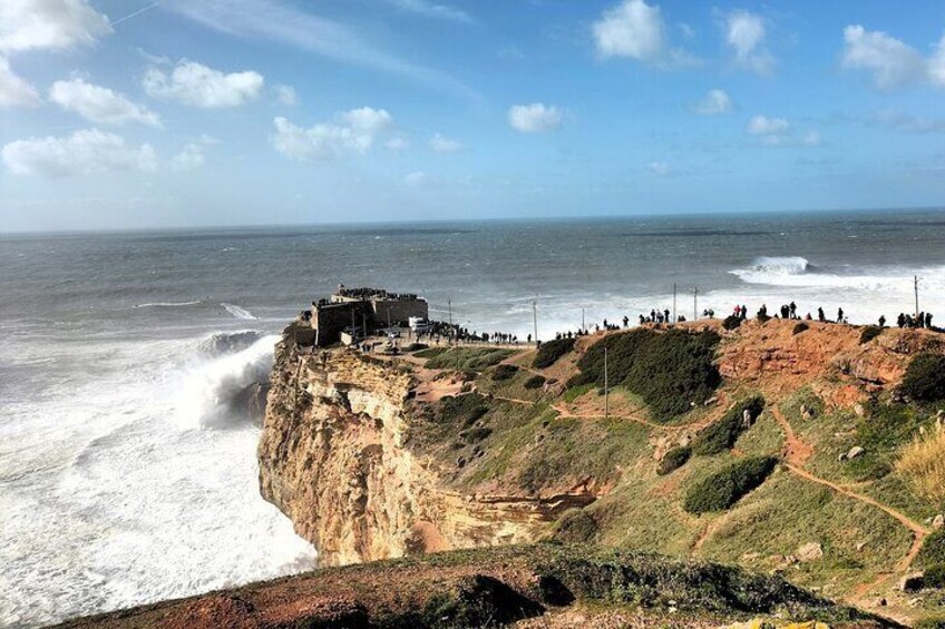 The-Amity-Family-Tours-And-Activities-Nazaré-Portugal-Landscape-Atlantic-Giant-Waves-Surf-Cliff-Fort