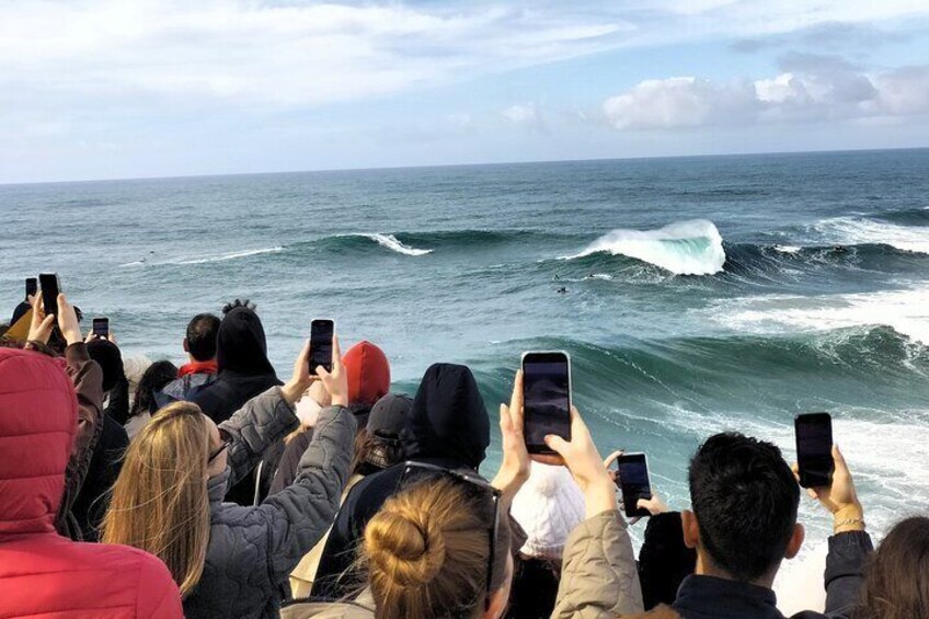 The-Amity-Family-Tours-And-Activities-Nazaré-Portugal-Landscape-Atlantic-Giant-Waves-Surf-Crowd-Shooting