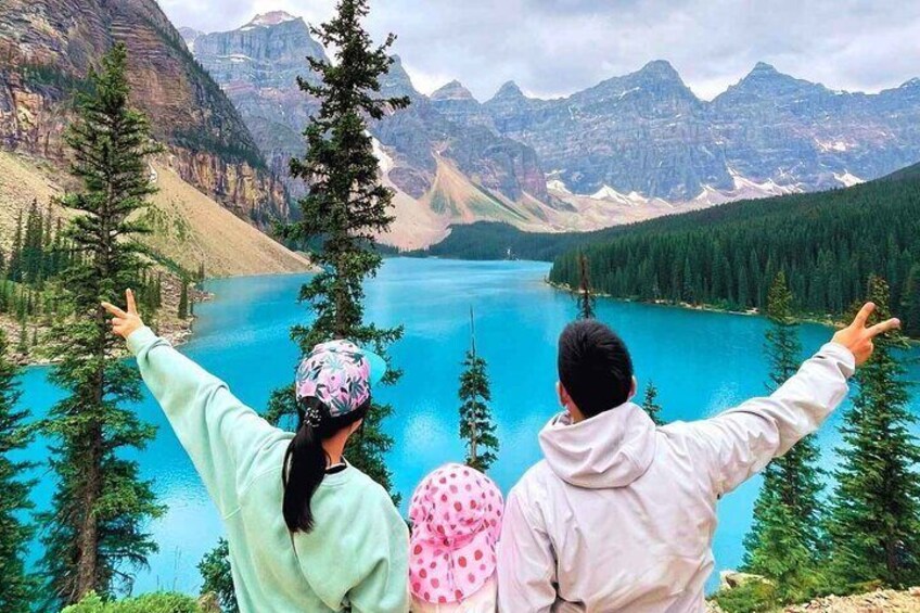 A family having fun at Moraine Lake