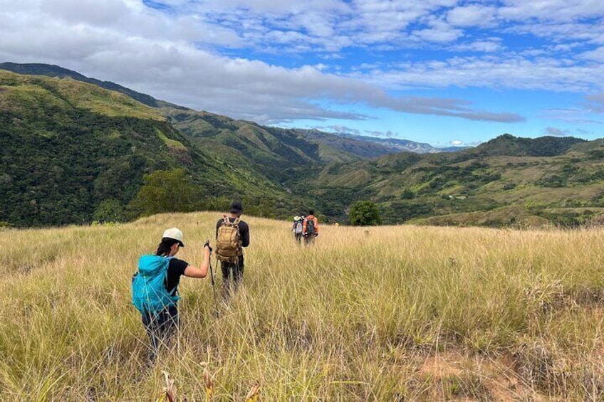 Setting out across the grassy hills