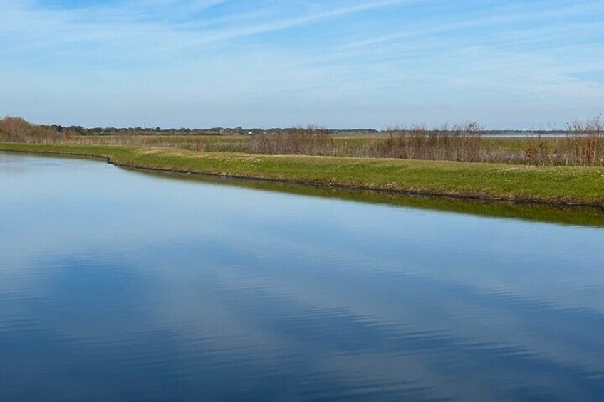 Beautiful blue skies reflecting off one of the ponds at St. Cloud park.