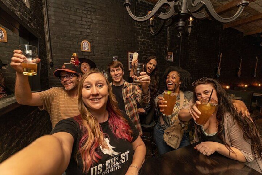 Bottoms up! Our guide tells fun stories on this epic Haunted Pub Crawl