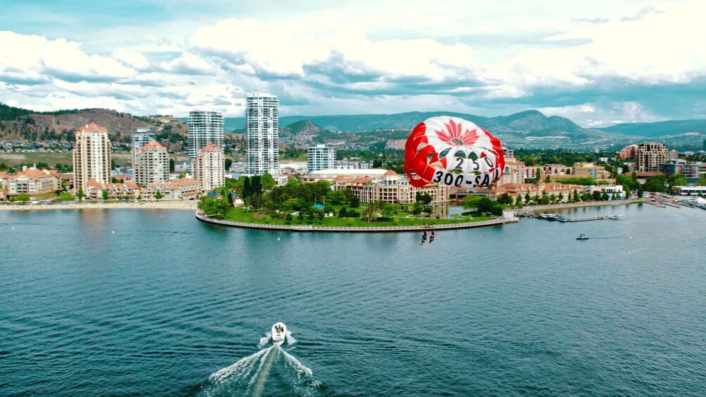 Picture 4 for Activity Kelowna: Early Bird Discount Parasailing Experience