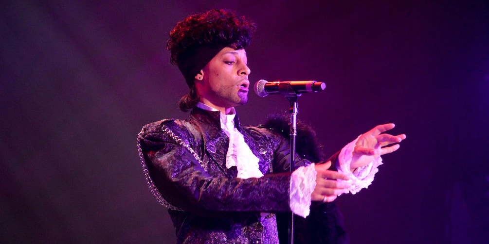 Prince impersonator performs