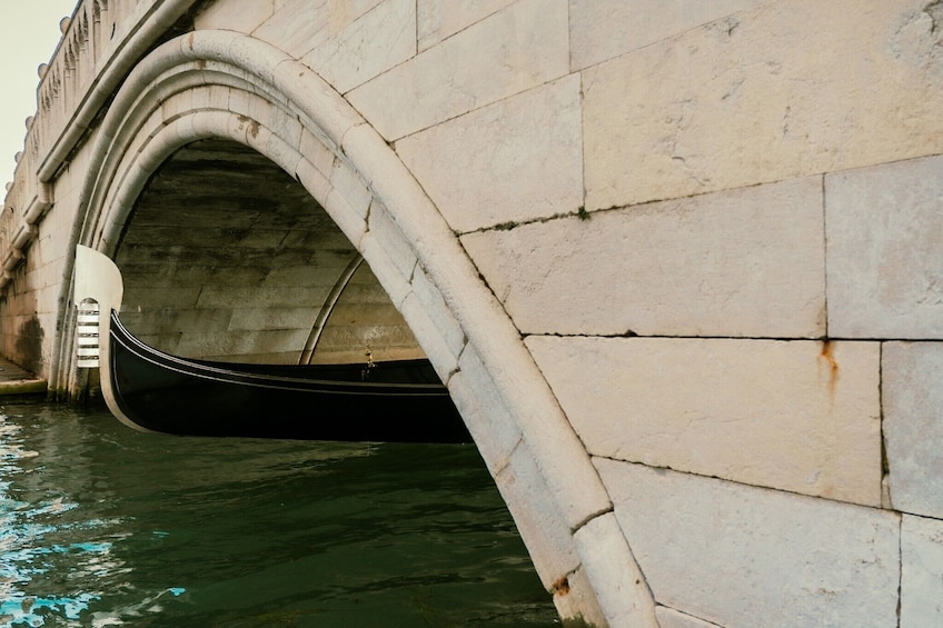 Shared gondola ride with passage underneath the Bridge of Sighs