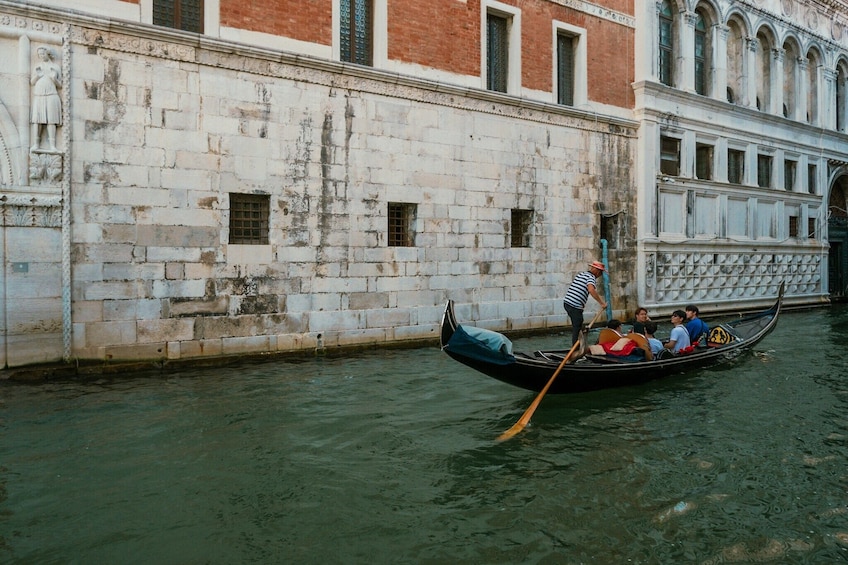 Shared gondola ride with passage underneath the Bridge of Sighs