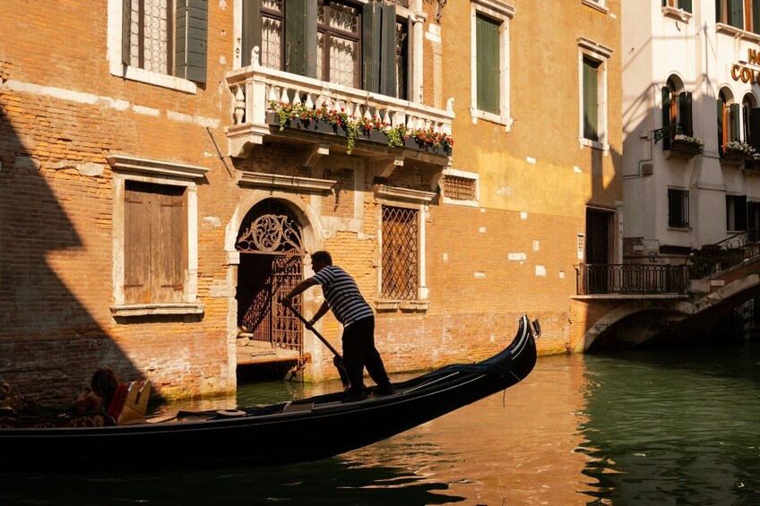 Shared gondola ride with passage underneath the Bridge of Sighs