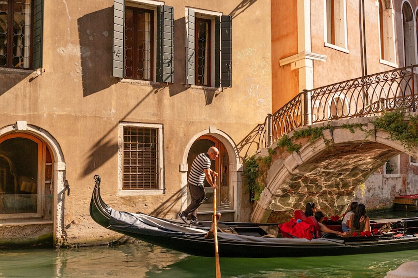 Shared gondola ride with passage underneath the Bridge of Sighs