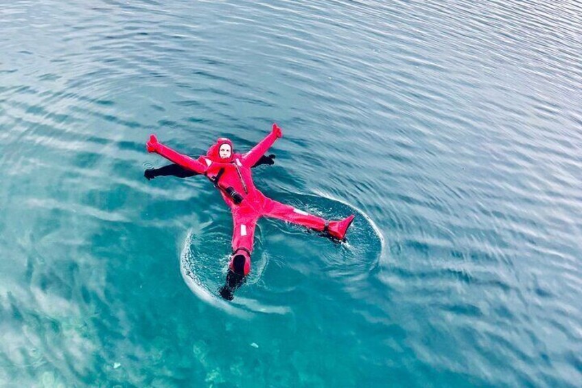 Arctic Ice Floating in Warm Survival Suit Tromsø