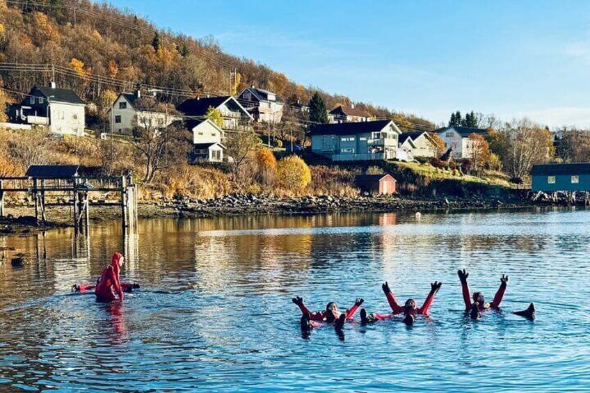 Arctic Ice Floating in Warm Survival Suit Tromsø