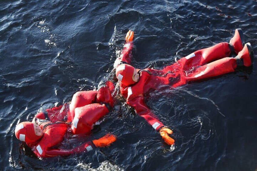 Arctic Ice Floating in Warm Survival Suit Tromsø