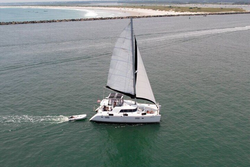 Bella sailing through Masonboro Inlet