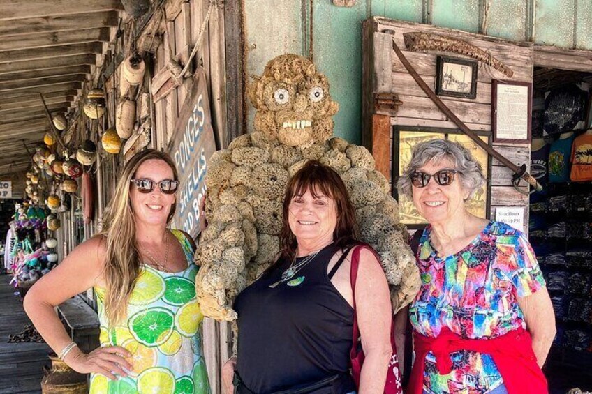 Tour guests and Kim posing with the Sponge guy
