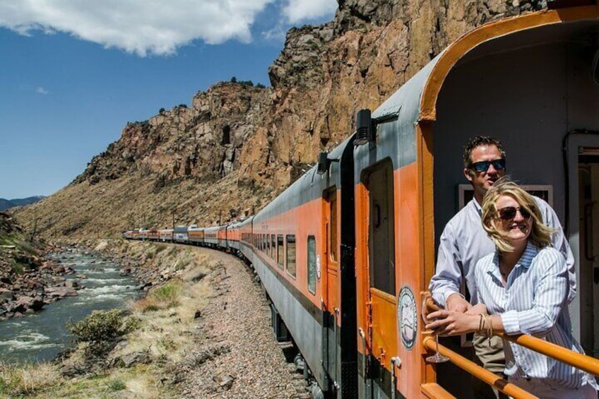 Royal Gorge Route Railroad guests enjoying Colorado's grandest canyon aboard one of our open-air cars.