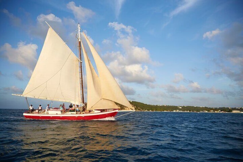 The West Indian built Tradiiton - an historic Caribbean rum-smuggler offers the best sunset sail and cocktail hour in Anguilla 