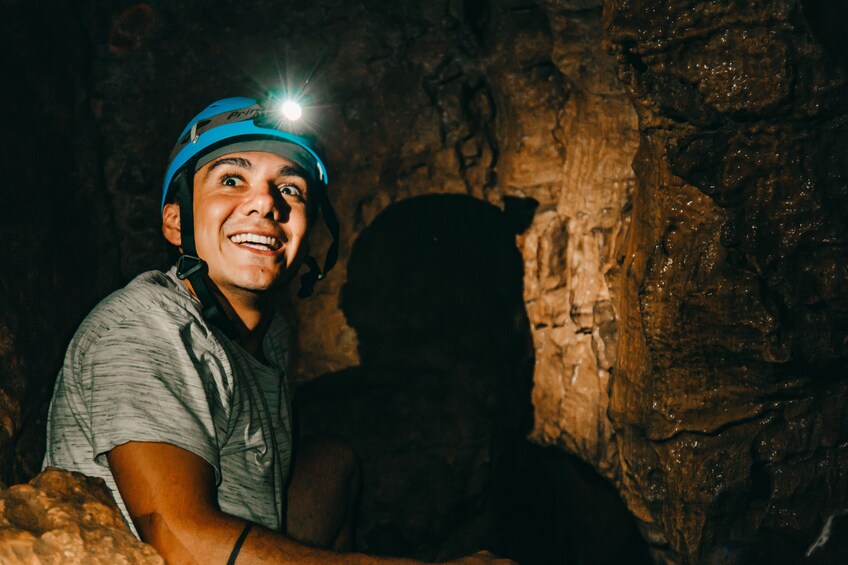 Woman enjoying the Venado Caves experience 