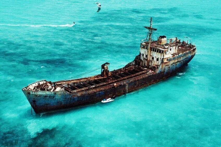 The shipwreck became firmly planted in the shallow waters of the Caicos Banks during Hurricane Frances in 2004. 