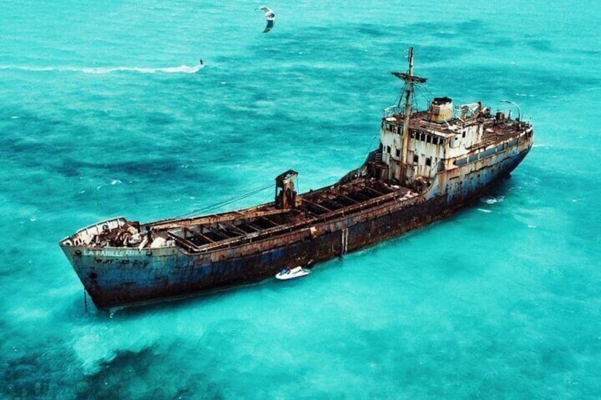 The shipwreck became firmly planted in the shallow waters of the Caicos Banks during Hurricane Frances in 2004.