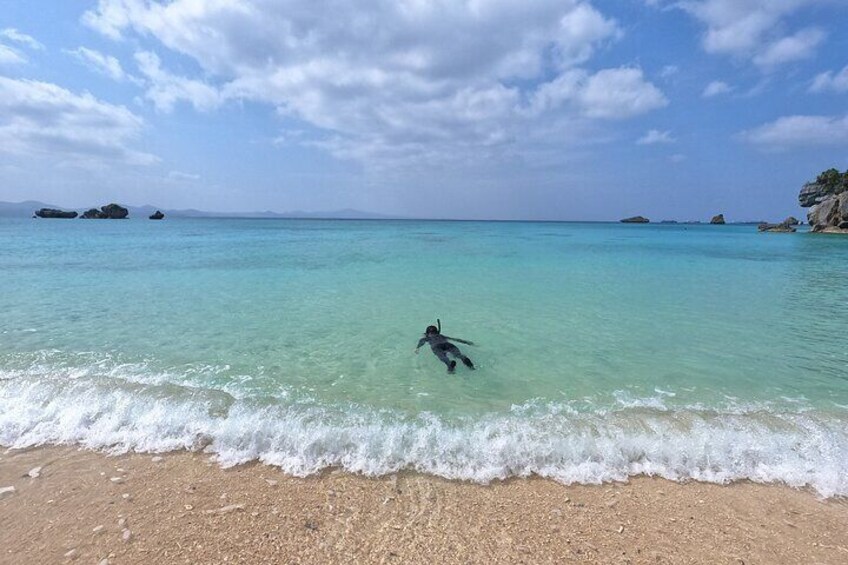 Snorkeling a white sand beach