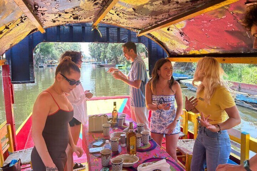 Xochimilco international boat party with margaritas and tequila.