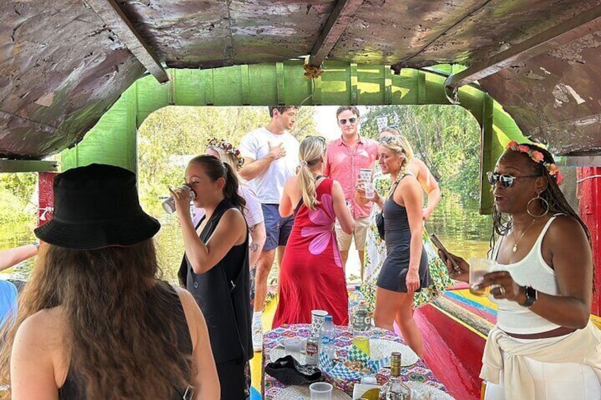 Xochimilco international boat party with margaritas and tequila.