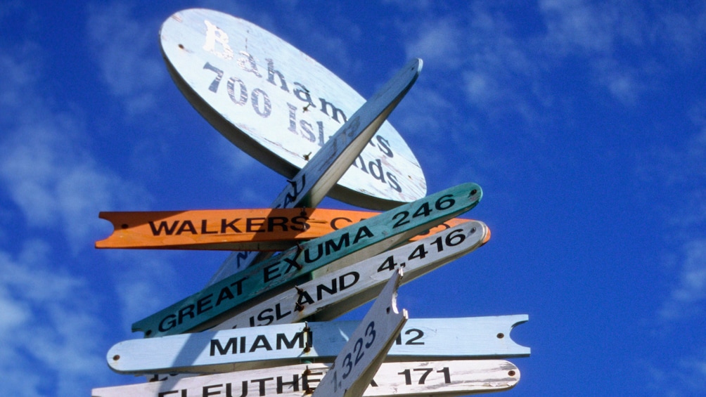 Directional sign on the beach in Bahamas