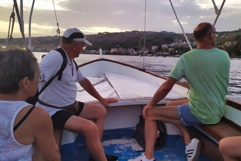 Aci Trezza boat tour sunset and dinner sicilian family home