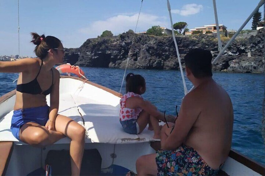 Aci Trezza boat tour sunset and dinner sicilian family home