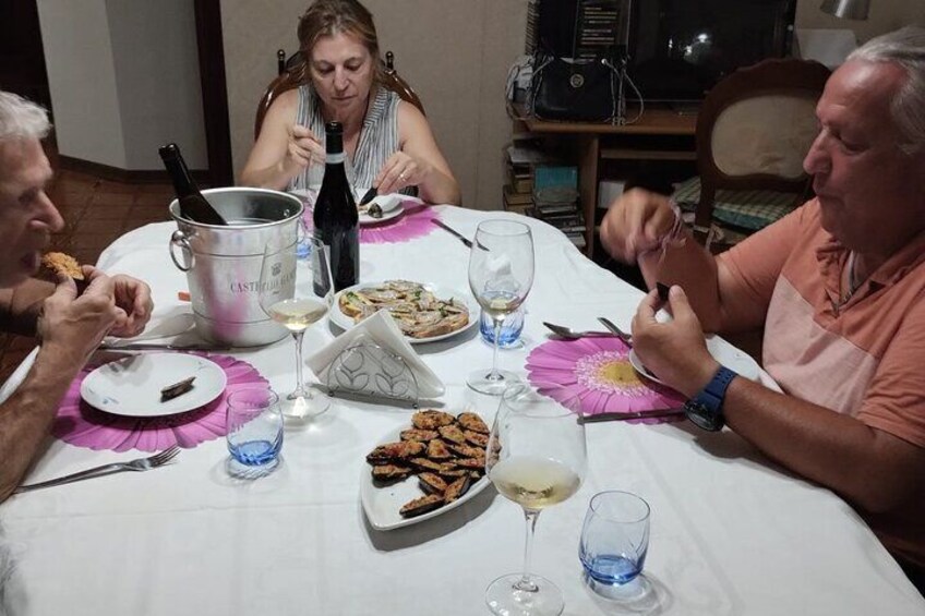 Aci Trezza boat tour sunset and dinner sicilian family home