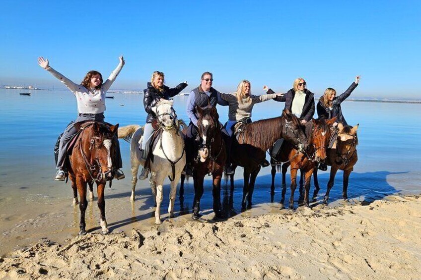 Passeio de cavalo pela praia em grupo