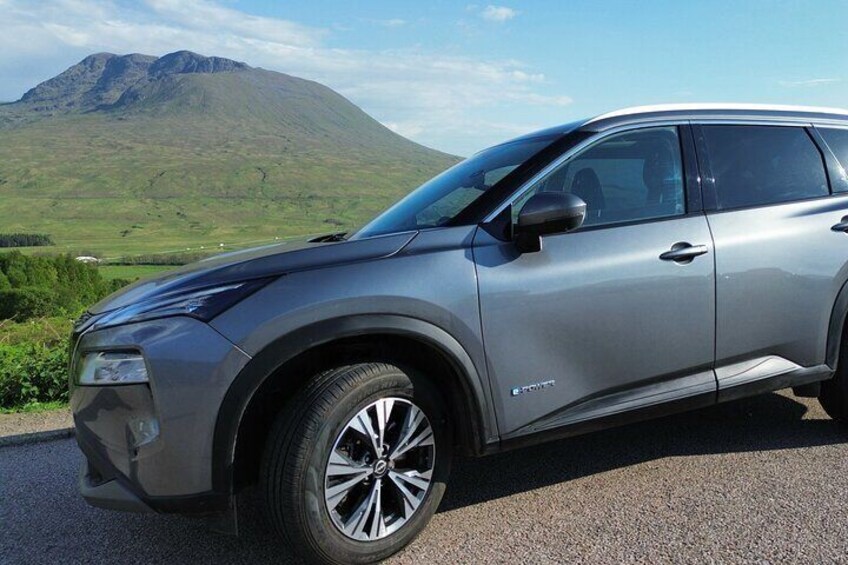 Welcome to our Scottish tour! 

Enjoy a stylish ride in our Nissan X-Trail 4x4 for 1-4 passengers, with AC, sunroof, and privacy glass. 

Explore Scotland's beauty with us!