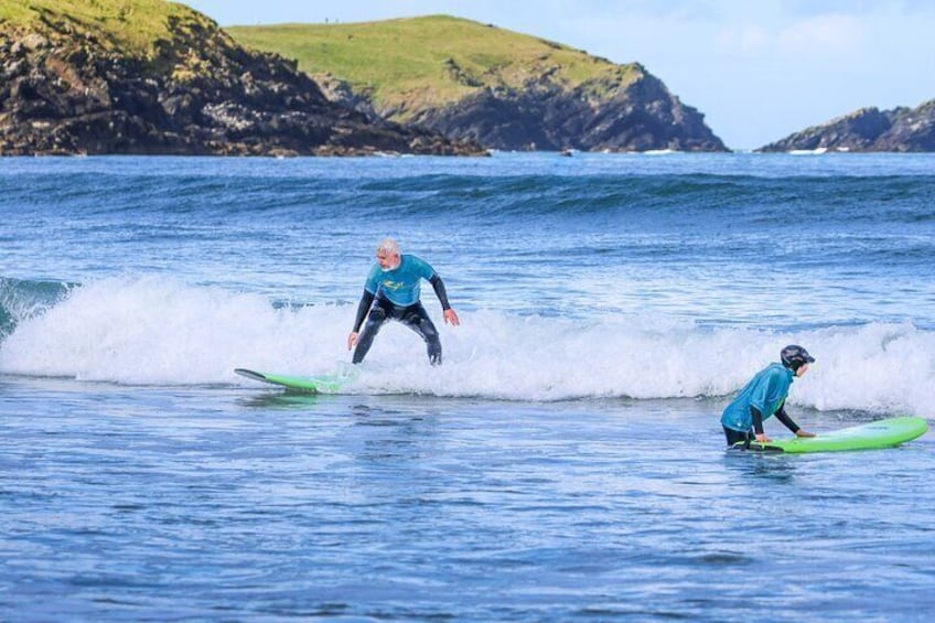 Catch waves against a stunning Cornish landscape