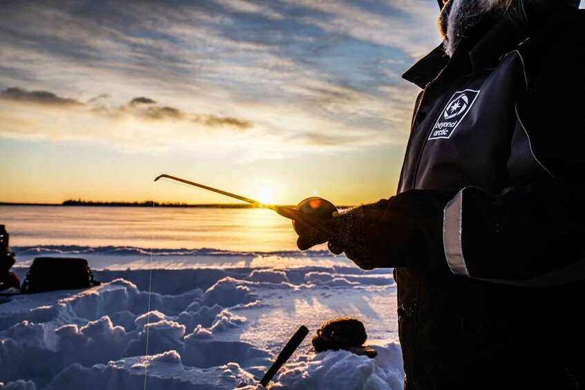 Picture 1 for Activity Levi: Ice Fishing on a Frozen Lake