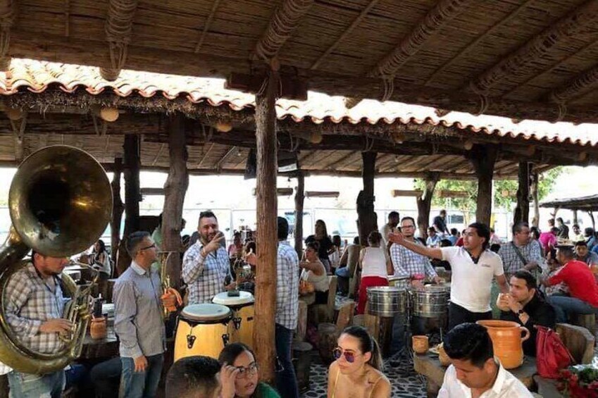 Listen to live music at Los Cantaritos and have fun as a group.