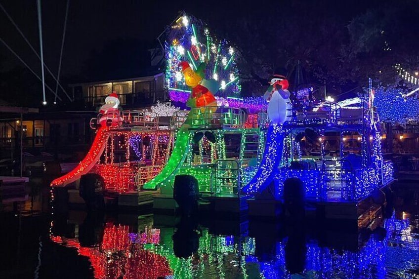 Double Decker Barges lined up at the Mozarts Christmas Light Show