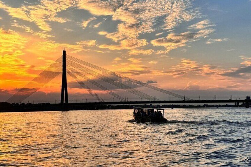 Riga: Evening/Sunset Boat Tour with Welcome Drink