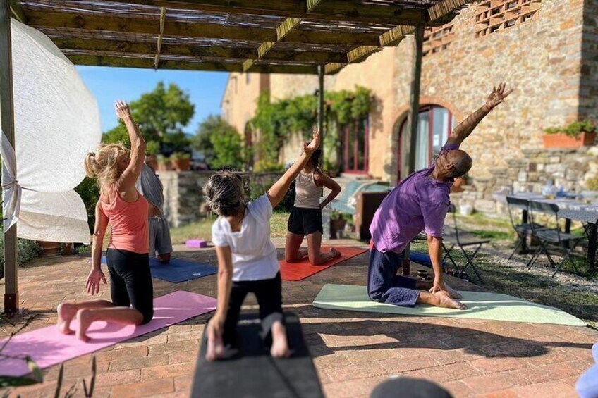 Yoga at Sunset Overlooking Tuscan Countryside