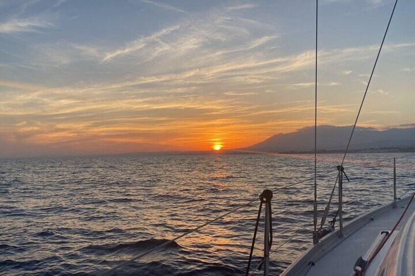 Sunset sailing along the cliffs of Maro- Private