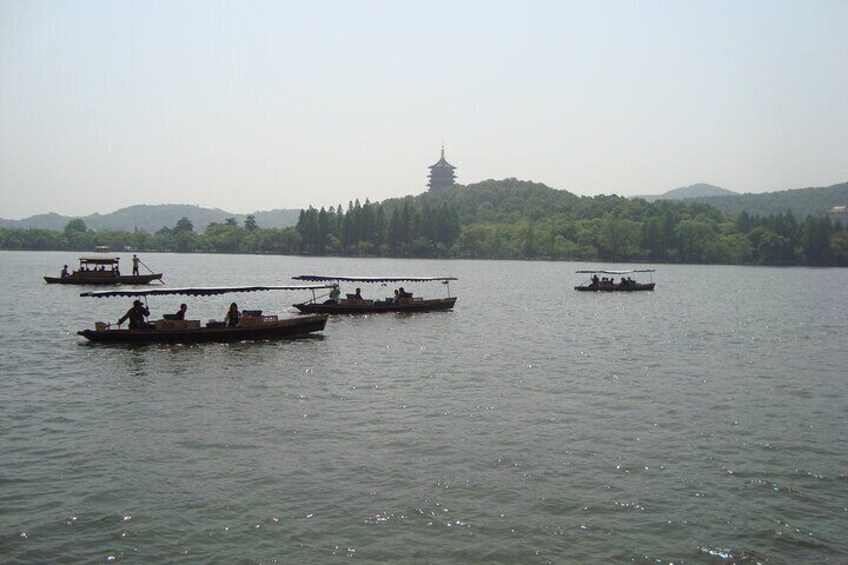 Shanghai to Hangzhou one day bullet train tour to boat at lakes.