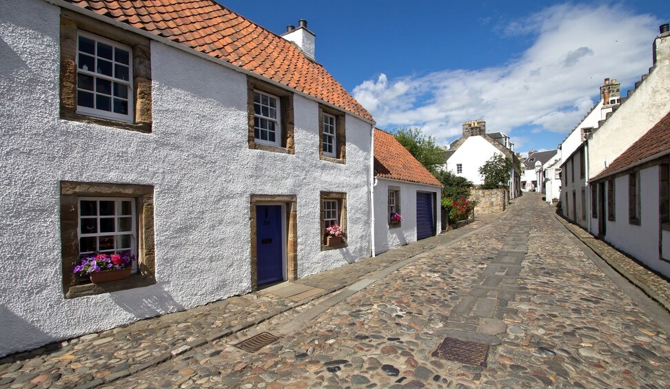 Show item 5 of 4. Cobblestone street in village of Culross, Scotland