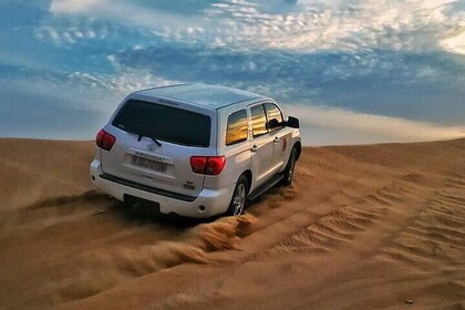 Dubai Desert Safari with Sand Boarding, BBQ Dinner, Camel ride