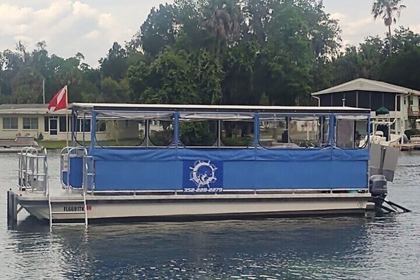 One of our tour boats on Kings Bay that you will be on to "See Crystal River"!