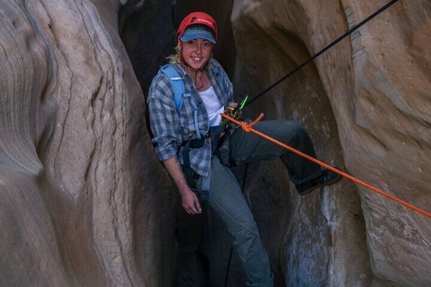 Rappelling Through Slot Canyon