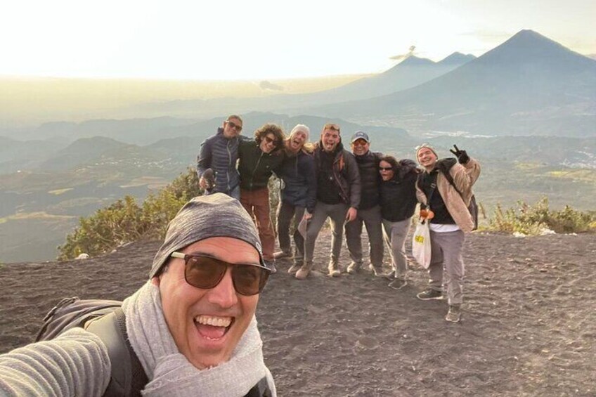 A group of friends enjoying a sunset tour at Pacaya volcano